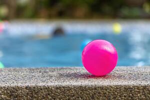 Pink Ball by the Pool photo