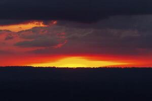 Fiery Sunset on the Horizon photo