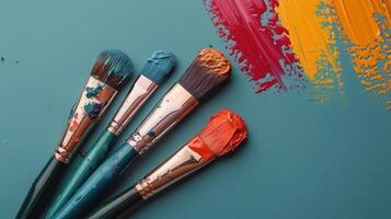 Group of Paint Brushes on Table photo