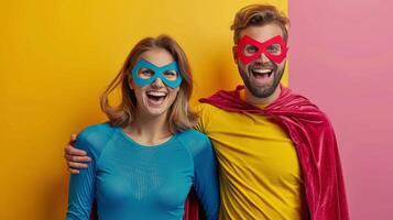 Man and Woman Dressed as Superheroes photo