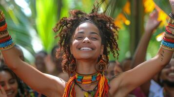 Woman With Dreadlocks Smiles and Raises Arms photo