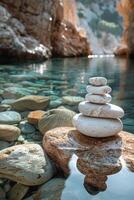 Stack of Rocks on Body of Water photo