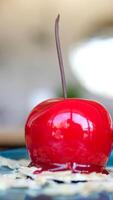 appetizing sweet piece of cake on a plate is eaten with a spoon. selective focus. sweet dessert for breakfast. cake with icing and decorated with berries photo