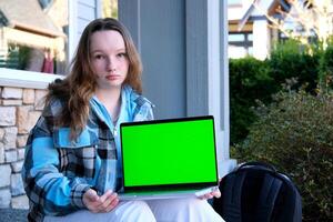 Chroma Key Green Screen Laptop Computer Girl photo