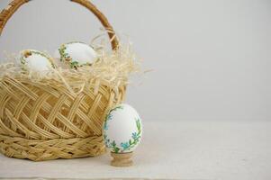 easter decoration wreaths and wooden eggs photo