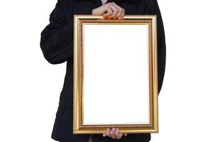 Closeup man holds empty photo frame or blank diploma certificate frame. Copy space for adding text or photos. Concept , Proud, memories and nostalgia .