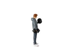 Miniature people , Young man lifting weights Isolated on white background with clipping path photo