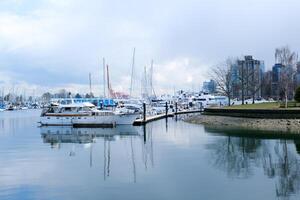 4k Beautiful harbour, port, marina, haven, sailing boats, yachts, blue water, lake, bay, trees, park, house, docks, calm, sunny day photo