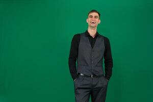 Young business man full body isolated on a white and green background photo