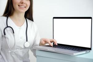Doctor Discussing Records With Patient Using Digital Tablet photo