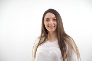 Portrait of beautiful smiling woman on white background photo