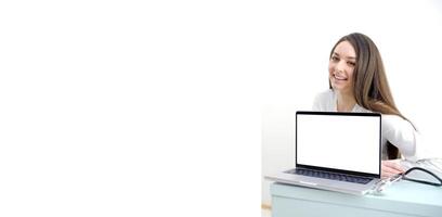 doctor clinic Isolated young business woman presenting laptop photo