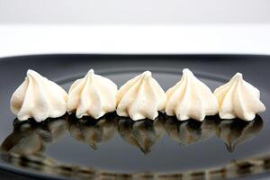 Meringue. sweet meringues. Meringue tray. Close up photo of meringues. Dessert Background.Merengue