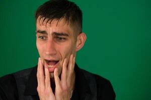 nice man in a black shirt with the beard poses funny faces photo