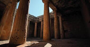 Tomb of the King ancient ruins in Paphos Cyprus. Ancient Greek columned hall in ruins - on an island in the Mediterranean Sea, a tourist destination. High quality 4k footage video