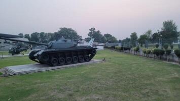 Army equipment using in war are placed in public park for kids in Lahore, Pakistan on May 15, 2024. photo