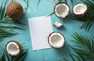 Blank Paper Surrounded by Coconuts and Leaves photo