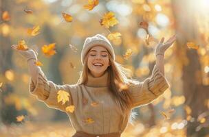 Woman With Hands Raised Surrounded by Leaves photo