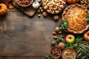 A Pie Surrounded by Thanksgiving Foods on Wooden Table photo