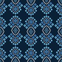 Traditional ethnic motifs ikat geometric fabric pattern cross stitch.Ikat embroidery Ethnic oriental Pixel blue background. Abstract,illustration. Texture,decoration,wallpaper. vector