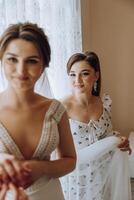 Two women are standing in front of a window photo