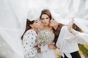 Three women are posing for a picture photo