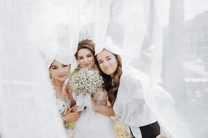 Three women are posing for a picture photo