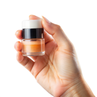 A hand holding a small jar of makeup png