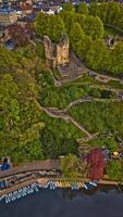 Historic Tower and River Boats Aerial View in Knaresborough, Yorkshire photo