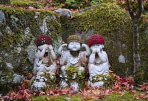 Three Buddhist statues at Daisho-in Temple, Miyajima Island, Japan photo