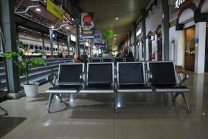 waiting seats for train passengers in Semarang, Indonesia 17 April 2024 photo