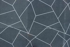 White seamless line pattern on grey granite floor background photo