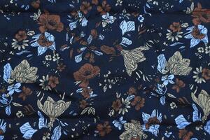 beautiful and colorful of art Indonesian navy color batik floral pattern photo