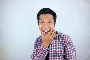head shot wow facial expression smiling asian man looking at the camera, isolated white background photo