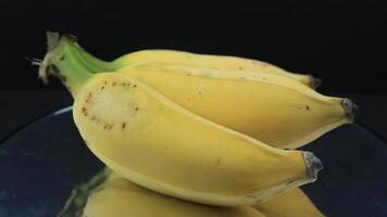 Bunch of bananas on black background photo