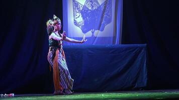 Traditional dance performance with shadow puppet video