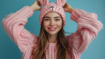 Woman Wearing Pink Bunny Ears Hat photo