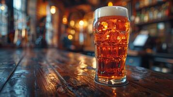 Glass of Beer on Wooden Table photo