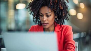 Woman Sitting in Front of Laptop Computer photo