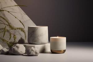 Two white marble candles with a golden base glows softly against a backdrop of grey stones, creating a minimalist eco-chic and natural vibe photo