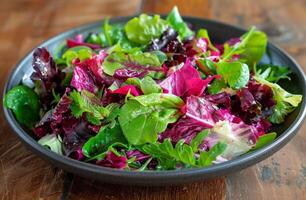 Bowl Filled With Green and Red Vegetables photo