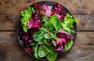Bowl Filled With Green and Red Vegetables photo