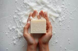 Person Holding Soap Bar photo