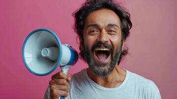 Man Holding Blue and Black Megaphone photo