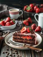 a slice of strawberry chocolate cake on the table photo
