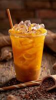 Thai tea with ice in a plastic cup photo