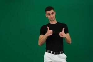 Full body businessman in glasses, black suit show thumb up like, agree hand sign gesture. Comic cartoon funny man in eyeglasses, big head. Funny face. Expert recommending. Green chroma key background photo