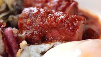 sausages mixed with tomato sauce video