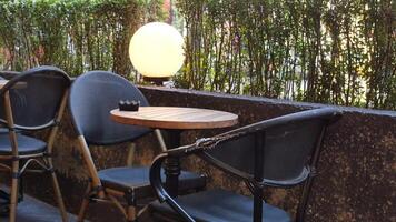 A city restaurant with empty chair and table outdoor furniture video