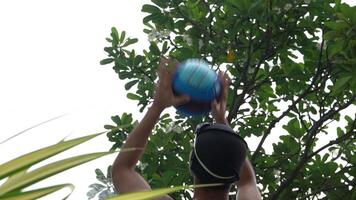 Asian men practicing swimming and preparing to play water polo and stretching and resting for water sports. video